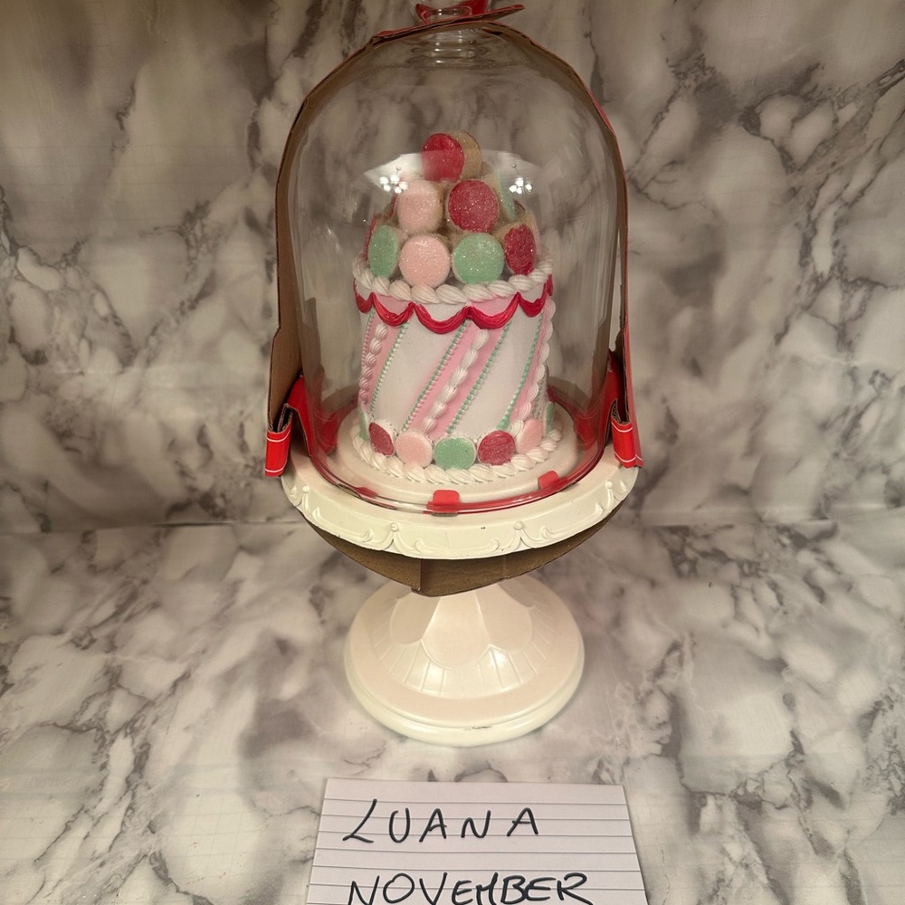 Colorful Decorative Cake Under Glass Dome